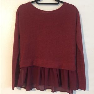 Wine color blouse w sheer detail.